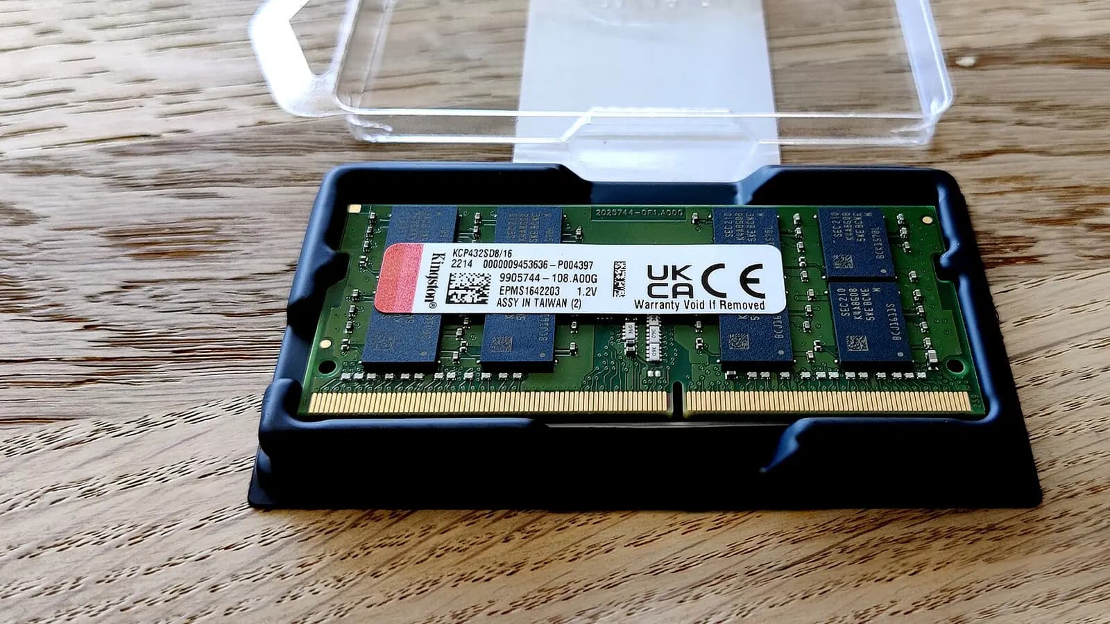Kingston SO-DIMM RAM module in a plastic tray with gold contacts and notch visible